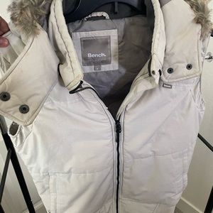 A white puffer vest